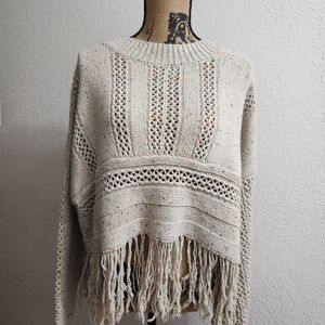 Elegant Cream Knit Sweater with Fringe